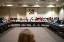 Student leaders talk with Ted Carter during the Jan. 16 pizza dinner in the Nebraska Union as part o