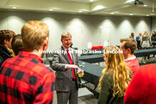 Student leaders talk with Ted Carter during the Jan. 16 pizza dinner in the Nebraska Union as part o