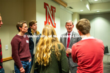 Student leaders talk with Ted Carter during the Jan. 16 pizza dinner in the Nebraska Union as part o