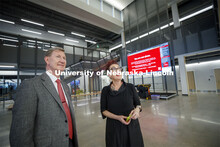NU President Ted Carter listens as Megan Elliott, founding director of the Johnny Carson Center for 