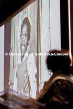 Ruby Bridges looks up at a photo of her as a first grader being integrated into New Orleans public s