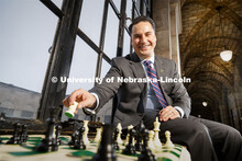 Heath Mello, lobbyist for University of Nebraska, is an avid chess player. He is shown in the state 