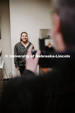 Olivia Cano has her photo taken by Scott Hurst. She was a winner in the Husker Passport Giveaway spo