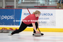 Anna Fiala of the UNL Curling Team throws a stone. Nebraska's nationally-ranked curling club host it