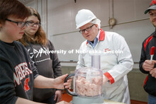 Professor Gary Sullivan leads the ASCI 100 Meats 2 course in a Processed Meats lab. The class made h
