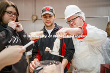 Professor Gary Sullivan leads the ASCI 100 Meats 2 course in a Processed Meats lab. The class made h