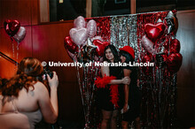 Huskers dance in formal attire during the 2020 OASIS Love Gala in the Wick Alumni Center. It is the 