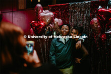 Huskers dance in formal attire during the 2020 OASIS Love Gala in the Wick Alumni Center. It is the 