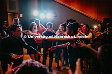 Huskers dance in formal attire during the 2020 OASIS Love Gala in the Wick Alumni Center. It is the 
