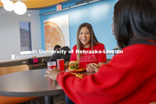 Cather Dining Center photoshoot. Young women eating together in the Cather Dining Center. March 2, 2