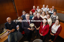 Chancellor Ronnie Green presents the Chancellor Cup to the Alumni Association for winning the Combin
