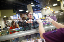 Harper Dining Center photo shoot. Student receiving food. March 3, 2020. 