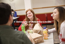 Selleck Dining Center photo shoot. Students socializing and eating a meal at the Selleck Dining Cent