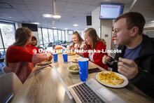 East Campus Dining Center photo shoot. Students eating and socializing at the East Campus Dining Cen