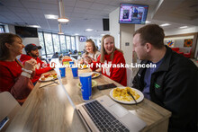 East Campus Dining Center photo shoot. Students eating and socializing at the East Campus Dining Cen