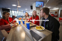 East Campus Dining Center photo shoot. Students eating and socializing at the East Campus Dining Cen