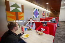 East Campus Dining Center photo shoot. Students eating and socializing at the East Campus Dining Cen