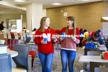 East Campus Dining Center photo shoot. Students eating and socializing at the East Campus Dining Cen