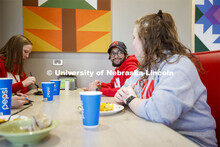 East Campus Dining Center photo shoot. Students eating and socializing at the East Campus Dining Cen