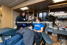 Heidi, of the Community Blood Bank, preps Fina Choat of St Edward, a Senior Pre-Veterinary Medicine 