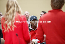 Temi Onayemi listens to student regents Emily Johnson and Keith Ozanne at NU Advocacy Day at the Cap