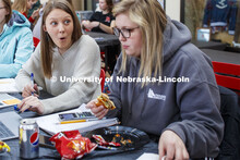 Emily Reitz, sophomore in Agricultural Education from Eaton, Colorado, reacts as she and Maggie Vyhn