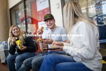 Sloane Tiarks, Chad Bode and Rachel Stewart enjoy lunch Wednesday. Lunch In The Lobby in the Animal 