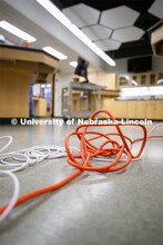 Chemistry labs become recording studios as connecting cables coil across the floor connecting comput
