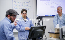 Saman Bagheri watches as Elijah Stowe counts down to the start of his recorded lab talk as he and Ri