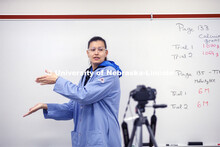 Jessica Periago, chemistry department lab manager, gestures to the side of the frame where the Power