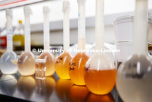 Flasks of liquids for future labs await their turn in the spotlight. As a result of the Corona virus