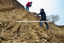 Judith Turk and Rebecca Young (stocking hat), assistant professors of natural resources, are being v