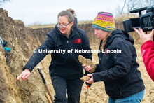 Judith Turk and Rebecca Young (stocking hat), assistant professors of natural resources, are being v
