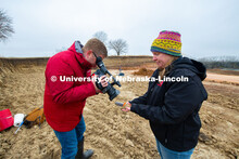Judith Turk and Rebecca Young (stocking hat), assistant professors of natural resources, are being v