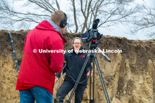 Judith Turk and Rebecca Young (stocking hat), assistant professors of natural resources, are being v