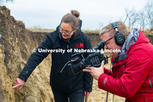 Judith Turk and Rebecca Young (stocking hat), assistant professors of natural resources, are being v