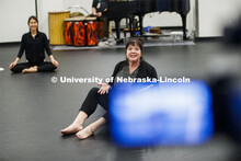 Susan Ourada, associate professor of dance, gives her students some recorded encouragement after tap