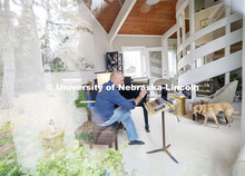 Professor Paul Barnes continues one-on-one instruction with student Cameron Berta, who is home in Da
