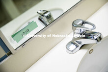 Sinks, toilets and shower stalls are labeled by room number to ensure privacy and cleanliness. To en