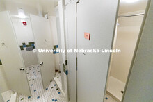 Sinks, toilets and shower stalls are labeled by room number to ensure privacy and cleanliness. To en