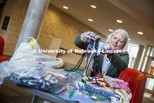 Veronica Riepe, director of student involvement, counts donated masks at University Suites before th