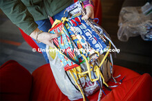 Veronica Riepe, director of student involvement, counts donated masks at University Suites before th