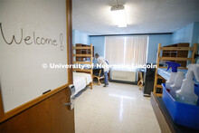 Cheryl Duncan, Residence Hall Custodial Leader with University Housing wears personal protective equ