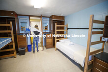 Cheryl Duncan, Residence Hall Custodial Leader with University Housing wears personal protective equ