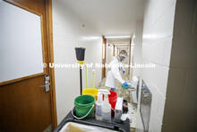 Cheryl Duncan, Residence Hall Custodial Leader with University Housing wears personal protective equ