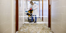 Cheryl Duncan, Residence Hall Custodial Leader with University Housing wears personal protective equ
