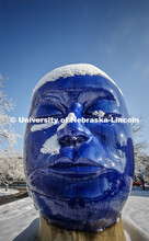 The “Untitled” head by Jun Kaneko in the Sheldon Sculpture Garden, is covered in a layer of snow