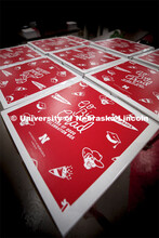 Printing Service employees work to fill the Go Big Grad boxes. Graduates will receive a "Go Big Grad