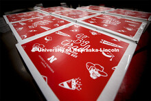 Printing Service employees work to fill the Go Big Grad boxes. Graduates will receive a "Go Big Grad