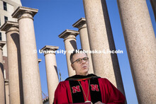 Chancellor Ronnie Green delivers his virtual commencement remarks front of the columns at the produc